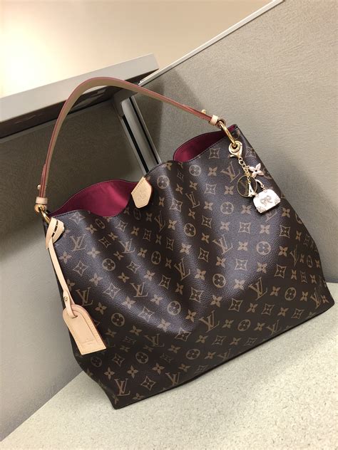 louis vuitton graceful neverfull|Louis Vuitton Neverfull bag.